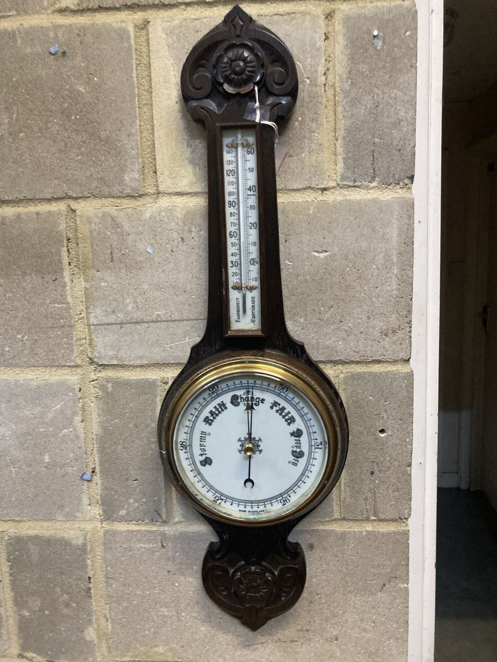 An Edwardian aneroid barometer and thermometer, height 86cm